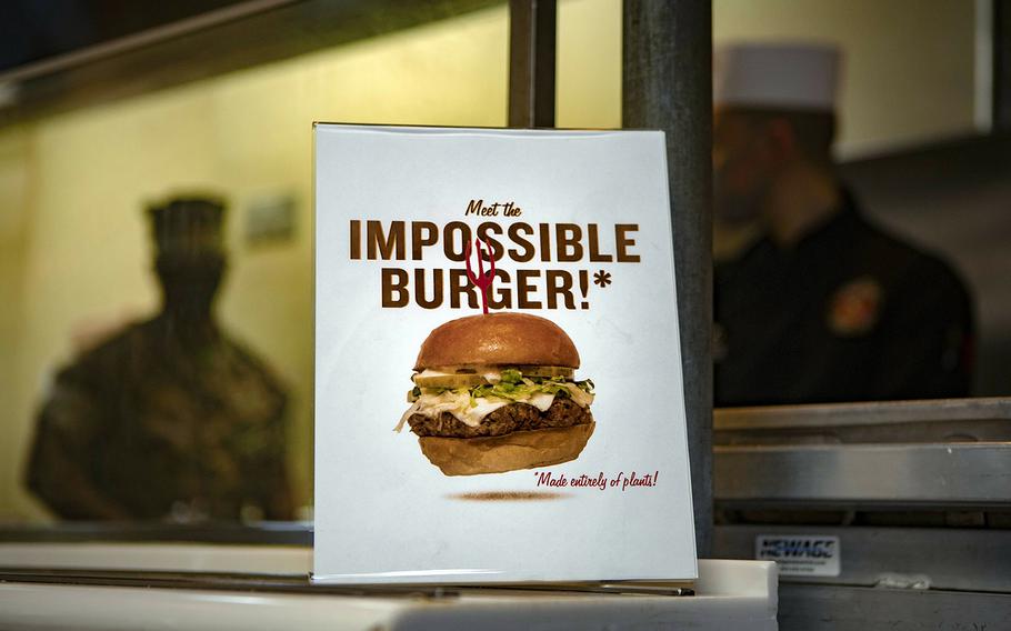 A sign advertises the meatless Impossible Burger at Marine Corps Air Station Futenma, Okinawa, May 13, 2020.