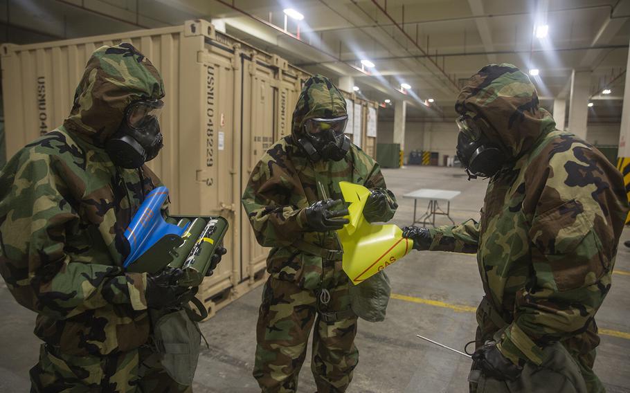 Marines with Combat Logistics Regiment 35 participate in a reconnaissance, surveillance and decontamination training course at Camp Kinser, Okinawa, Japan, July 17, 2018.