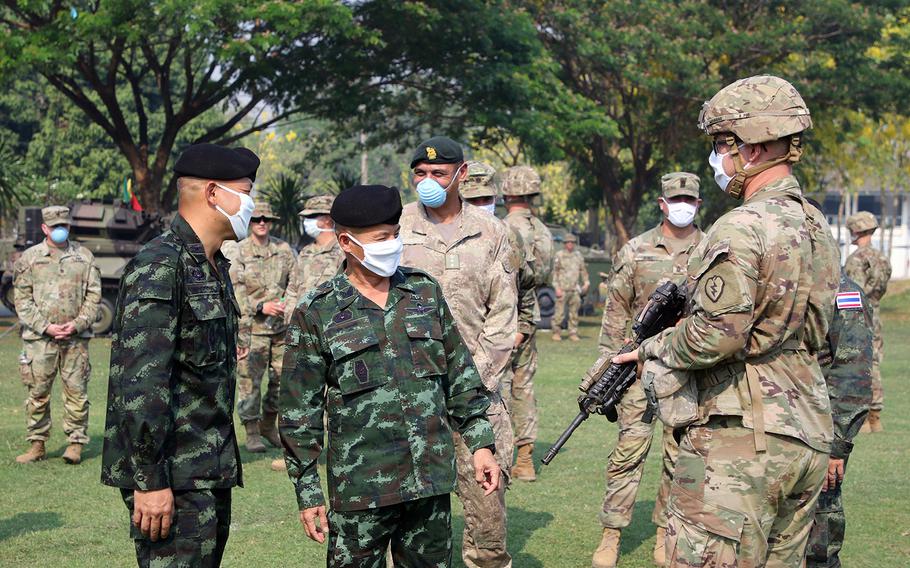 Royal Maj. Gen. Takad Lordsiri speaks with a U.S. soldier during the opening ceremony of the Hanuman Guardian exercise, part of Pacific Pathways,  at Fort Kanchanaburi, Thailand, March 31, 2020.