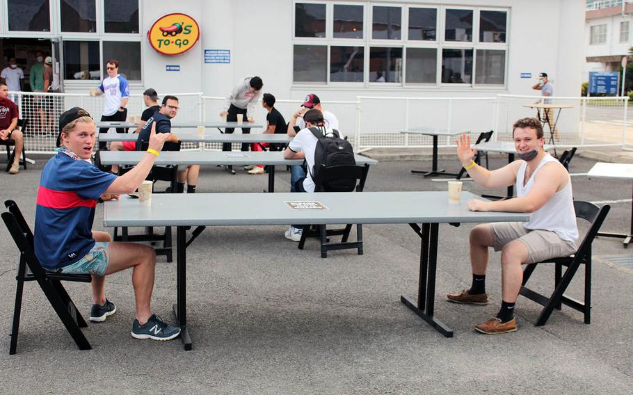 Sailors at Sasebo Naval Base demonstrate social distancing at a beer garden that opened outside the base enlisted club on Friday, May 29, 2020.