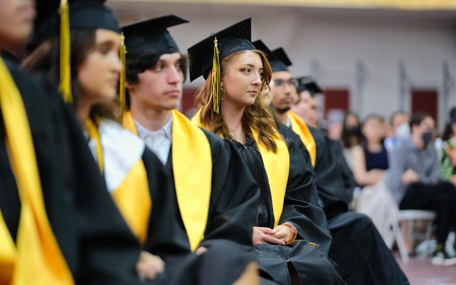 Seniors listen to a guest speaker during a Humphreys High School graduation ceremony inside Collier Community Fitness Center at Camp Humphreys, South Korea, Thursday, June 4, 2020.