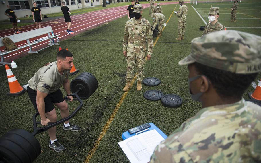 Army Sgt. Marino Cabral, 23, of New York, N.Y., takes part in a combat fitness test competition at Camp Zama, Japan, Monday, June 8, 2020. 