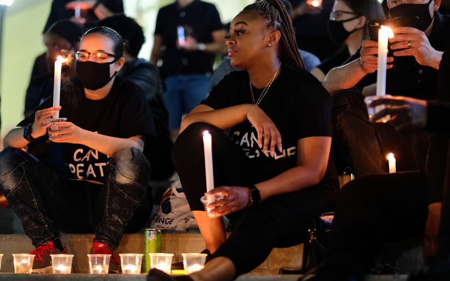 A candlelight vigil organized by Army Spc. David Perkins honors George Floyd at Downtown Plaza on Camp Humphreys, South Korea, Thursday, June 11, 2020.