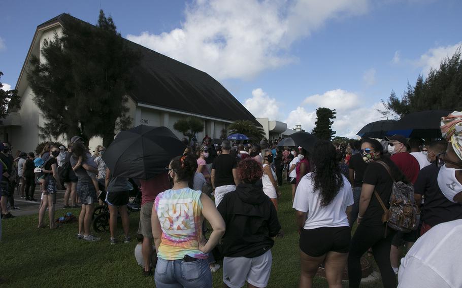 More than 400 people turned out to grieve the death of George Floyd and stand in against racial injustice during a vigil at Kadena Air Base, Japan, Saturday, June 13, 2020.
