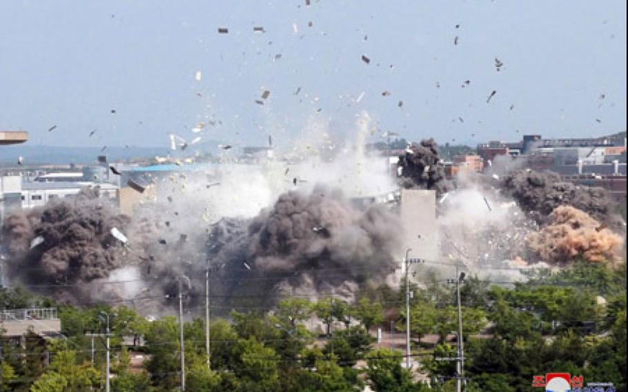 North Korea blows up a joint liaison office near the border with South Korea, Tuesday, June 16, 2020, in this image released by the Korean Central News Agency.