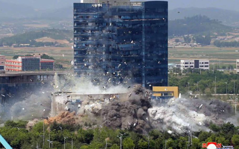 North Korea blows up a joint liaison office near the border with South Korea, Tuesday, June 16, 2020, in this image released by the Korean Central News Agency.