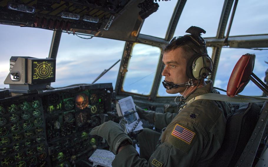 Then-Lt. Col. Andrew Campbell flies a C-130H during an Operation Christmas Drop mission over the Pacific Ocean, Dec. 9, 2015. Campbell, who is now a colonel, took command of the 374th Airlift Wing at Yokota Air Base, Japan, Monday, June 22, 2020.