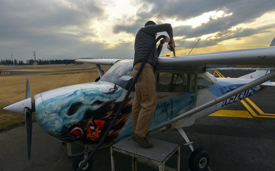 Then-Lt. Col Andrew Campbell fuels up a Yokota Aero Club plane while working on his single-engine pilot's license in February 2016. Campbell, who is now a colonel, took command of the 374th Airlift Wing at Yokota Air Base, Monday, June 22, 2020.