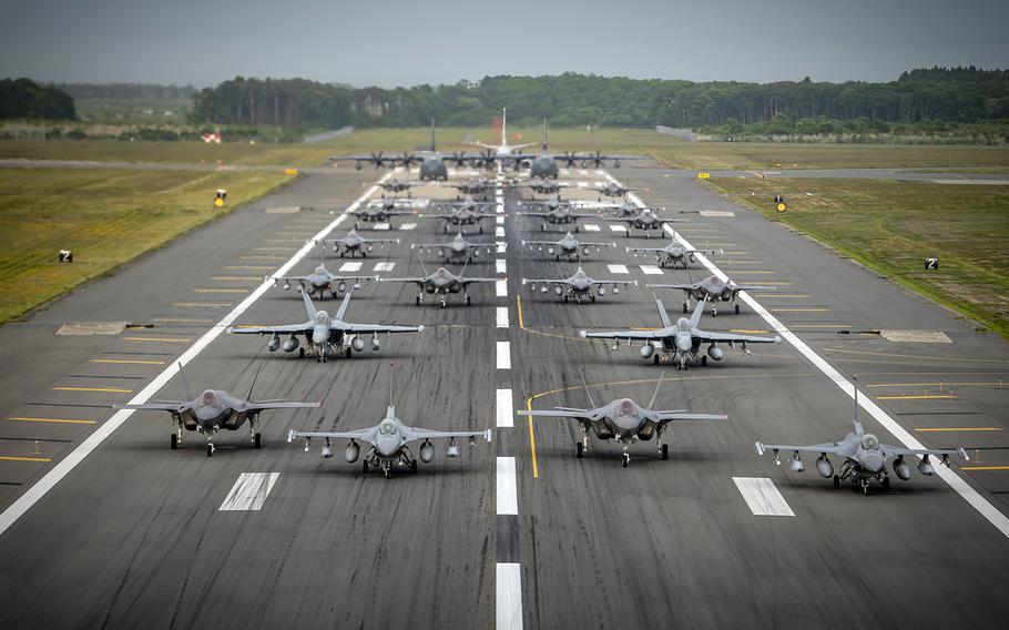 Twelve Air Force F-16CM Fighting Falcons, 12 Japanese F-35A Lightning II stealth fighters, two Navy EA-18G Growlers, a Navy C-12 Huron, two Air Force MC-130J Commando IIs and a Navy P-8 Poseidon participate in a show of force at Misawa Air Base, Japan, June 22, 2020.