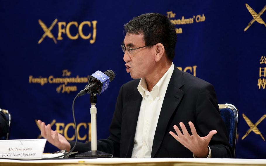 Japan's defense minister, Taro Kono, speaks to reporters at the Foreign Correspondents' Club of Japan in Tokyo, Thursday, June 25, 2020.