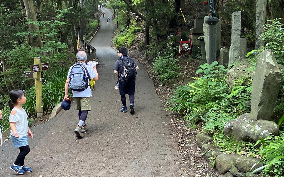 Families trek up Mount Takao, a popular hiking spot near Yokota Air Base, Japan, Saturday, June 27, 2020.