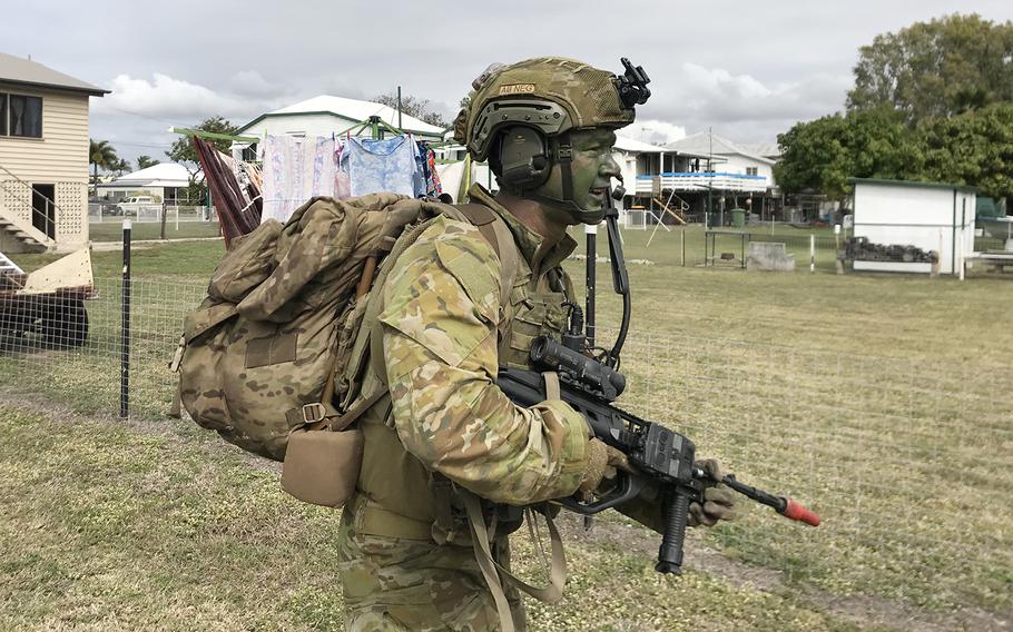 An Australian soldier patrols with U.S. Marines in Summer 2019 during the Talisman Sabre exercise in Queensland, Australia.