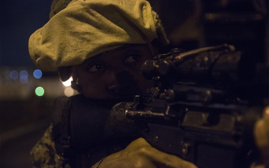 A member of the 31st Marine Expeditionary Unit provides security during training at Camp Foster, Okinawa, Jan. 12, 2017.