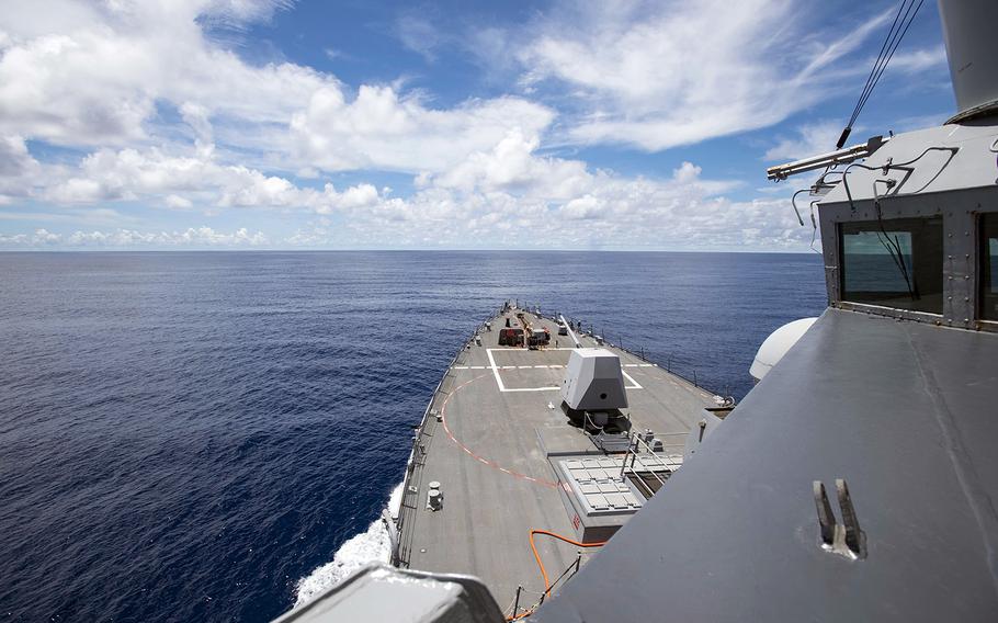The guided-missile destroyer USS Ralph Johnson steams near the Spratly Islands in the South China Sea, July 14, 2020.