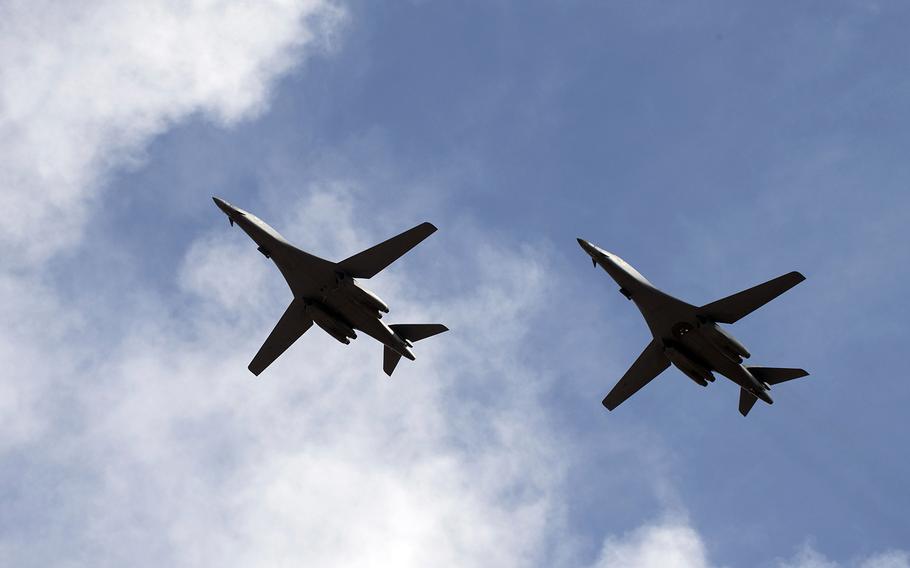 Two B-1B Lancers conduct a flyover before landing at Andersen Air Force Base, Guam, July 17, 2020.