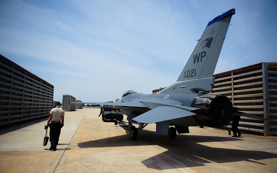 An F-16 Fighting Falcon is taken back to the flight line after a full paint job in 2014 at Kunsan Air Base, South Korea.