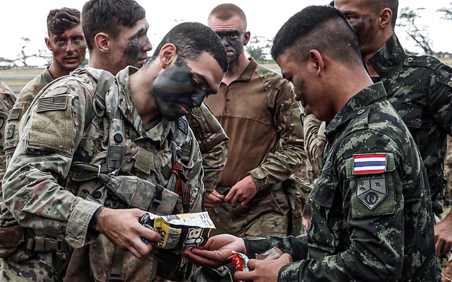 Soldiers with the 25th Infantry Division and Royal Thai Army mix during the Lightning Forge exercise in Hawaii, July 12, 2020.