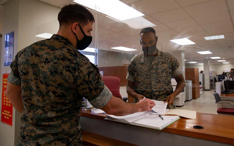 Marines on Okinawa comply with coronavirus mitigation measures in this photo posted to the Marine Corps Installations Pacific Facebook page on July 30, 2020.