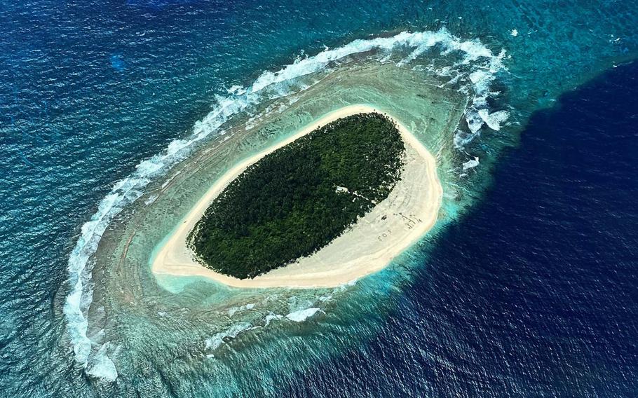 Guardsmen locate three missing mariners on Pikelot Island during a search and rescue mission in the Federated States of Micronesia, southwest of Guam, Aug. 2, 2020.