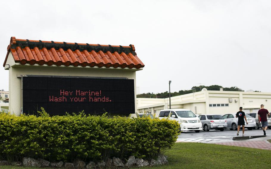A message reminds Marines to wash their hands to guard against the coronavirus at Camp Foster, Okinawa, March 31, 2020.