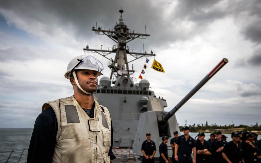 Sailors stand on deck as the guided-missile destroyer USS Dewey arrives at Pearl Harbor, Hawaii, for the Rim of the Pacific exercise in 2018. The ship is one of eight U.S. vessels participating in RIMPAC 2020, which runs through Aug. 31.