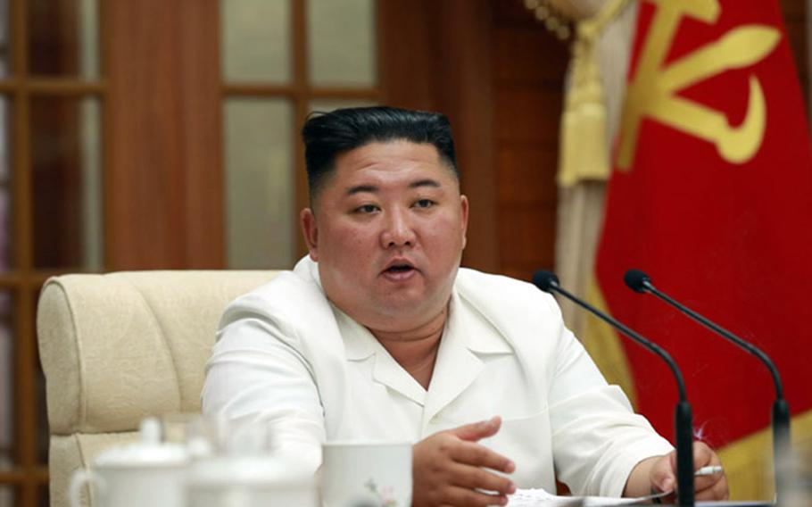 North Korean leader Kim Jong Un presides over a political meeting on Tuesday, Aug. 25, 2020, in this photo released by the Korean Central News Agency.