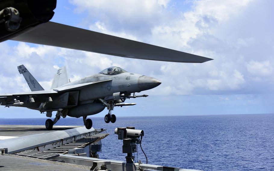 An F/A-18E from Strike Fighter Squadron 195 takes off from the aircraft carrier USS Ronald Reagan in the South China Sea, Aug. 14, 2020. 