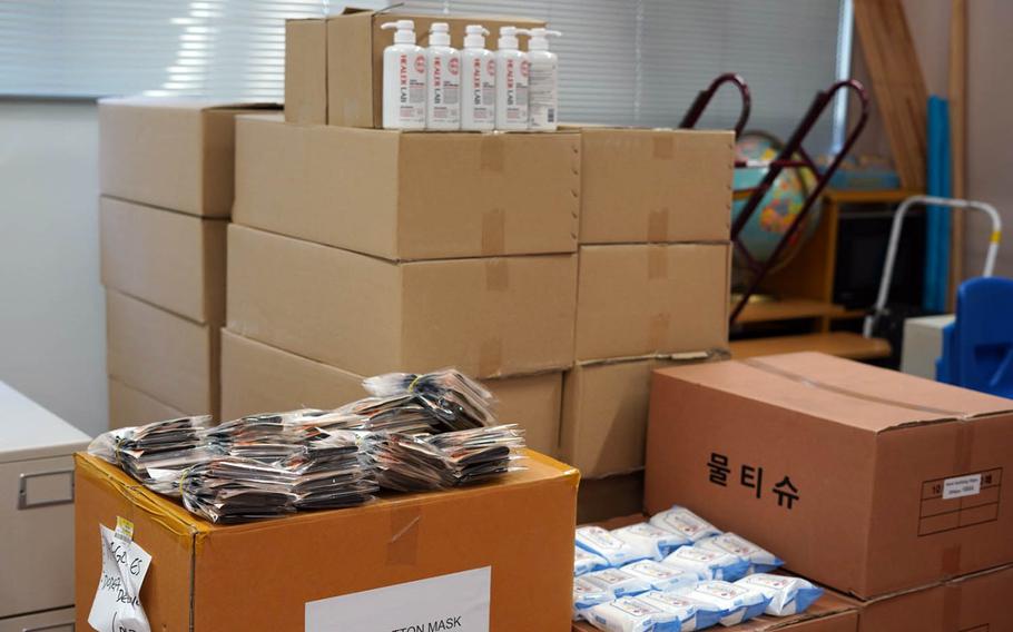 Boxes of hand sanitizer, cleaning wipes, face masks and other supplies are stored for student use at Ikego Elementary School, Japan. Aug. 24, 2020.