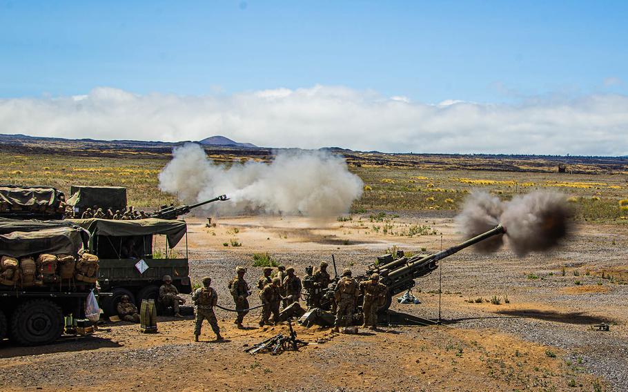 Marines with Battery C, 1st Battalion, 12th Marine Regiment, fire M777 Howitzer rounds at Pohakuloa Training Area, Hawaii, July 21, 2020.