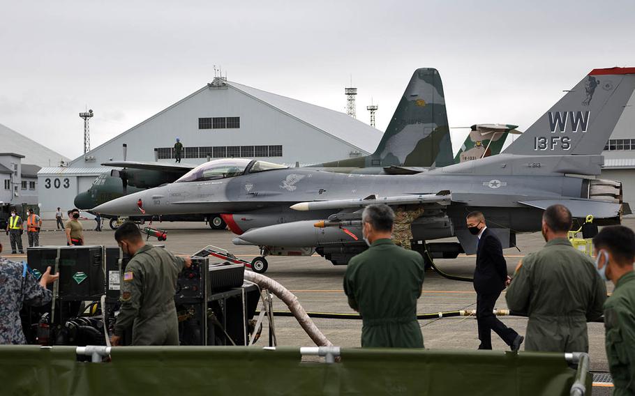 An Air Force F-16C Fighting Falcon is refueled by a Japan Air Self-Defense Force aircraft during training at Chitose Air Base in Hokkaido, Japan. Aug. 25, 2020.