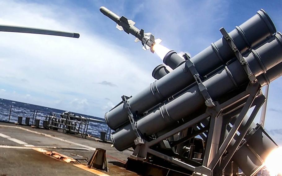 The guided-missile cruiser USS Antietam launches a Harpoon surface-to-surface missile Sept. 19, 2020, during a joint force sinking exercise targeting the decommissioned frigate USS Curts as part of the Valiant Shield exercise near Guam.