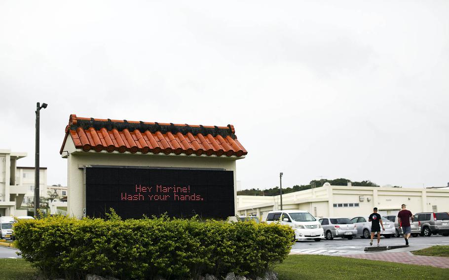 A sign outside Gunner's Fitness Center on Camp Foster, Okinawa, reminds Marines to guard against the coronavirus, March 31, 2020.