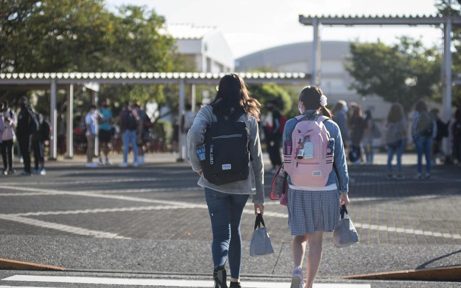 Students head to their first day of in-person classes at  Nile C. Kinnick High School at Yokosuka Naval Base, Japan, Monday, Sept. 28, 2020.