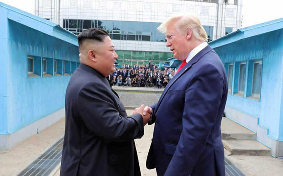 North Korea leader Kim Jong Un greets President Donald Trump on the North Korean side of the Joint Security Area, June 30, 2019, in this photo from the Korean Central News Agency.
