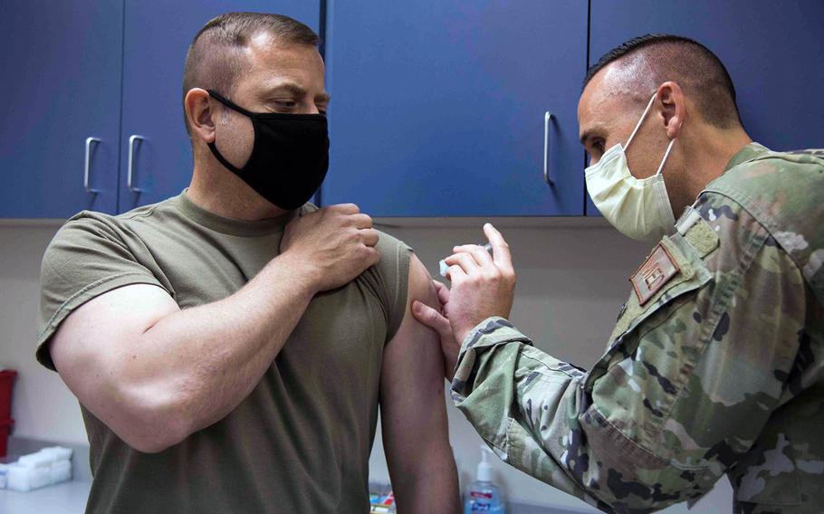Col. Jesse Friedel, commander of the 35th Fighter Wing, receives his annual flu shot at Misawa Air Base, Japan, Wednesday, Sept. 30, 2020.