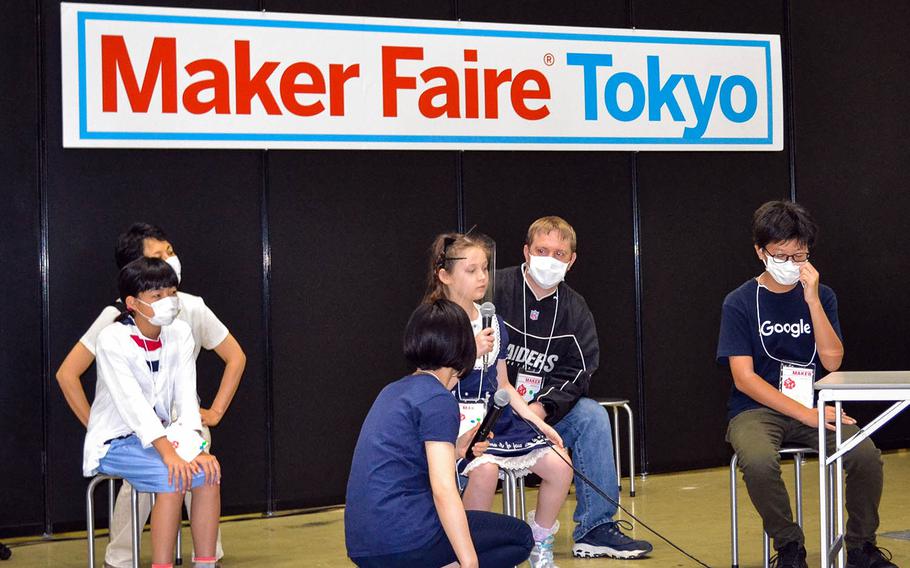 Alice Stratton, a fourth-grader at Daihachi Elementary School near Yokota Air Base, Japan, tells the judges about her invention, an LED game clock, during Maker Faire 2020 in Tokyo, Saturday, Oct. 3, 2020.