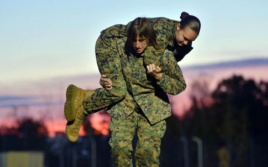 Marines take the combat fitness test at Panzer Kaserne, Germany, Oct. 25, 2019. The test is composed of an 880-yard sprint, lifting an ammunition can overhead repeatedly for two minutes and the maneuver-under-fire, in which Marines conduct combat-related tasks.