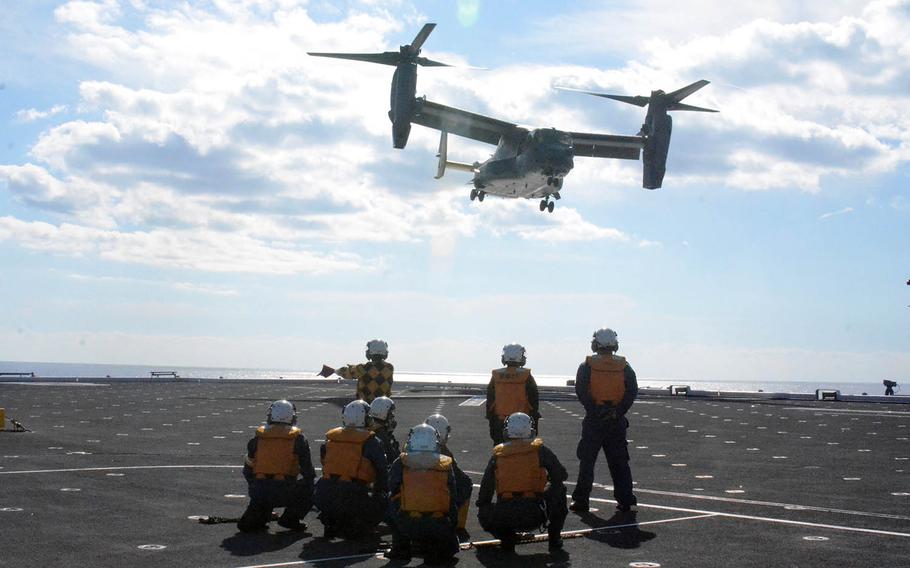 An Air Force CV-22 Osprey carrying U.S. Forces Japan chief Lt. Gen. Kevin Schneider and Japan's top military leader, Gen. Koji Yamazaki, lands on the helicopter destroyer JS Kaga on Monday, Oct. 26, 2020.