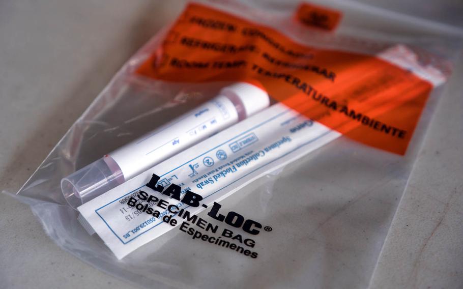 A coronavirus specimen bag awaits a service member arriving at Osan Air Base, South Korea, July 14, 2020.