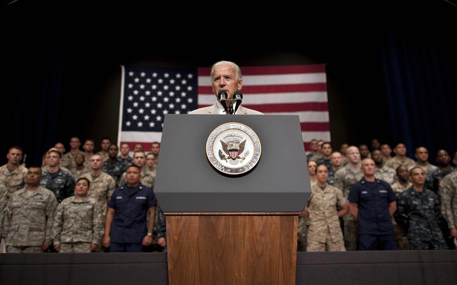 Then-Vice President Joe Biden speaks to military personnel inside the Taiyo Community Center at Yokota Air Base, Japan, Aug. 24, 2011.