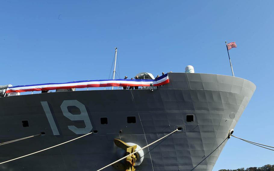 Sailors aboard the U.S. 7th Fleet flagship, USS Blue Ridge, decorate the ship at Yokosuka Naval Base, Japan,  Nov. 14, 2020, in preparation of its 50th anniversary.