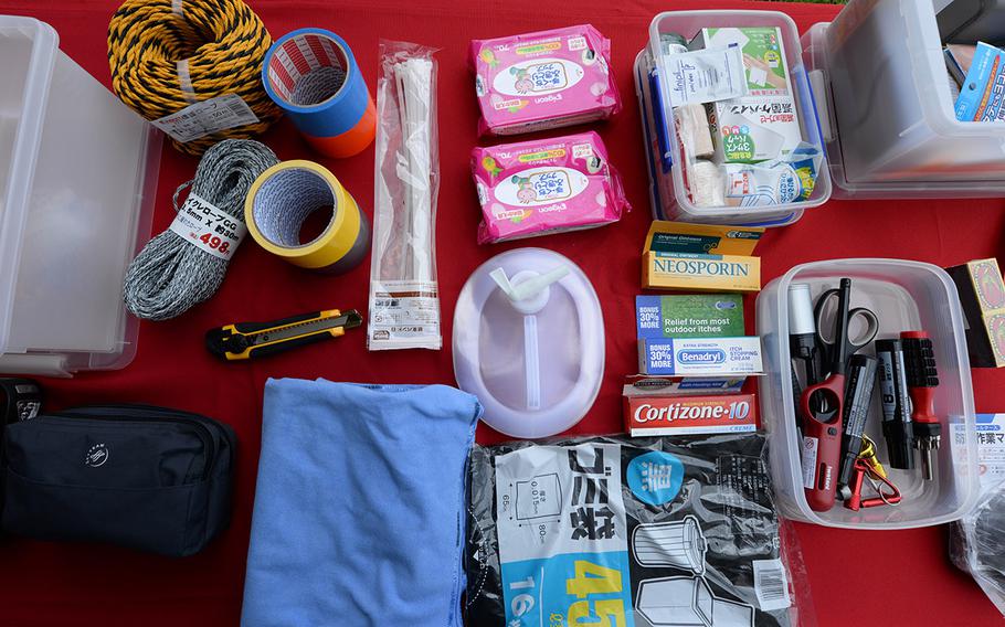 An August, 2015 file photo shows the contents of a typhoon kit are displayed on a table in front of the Exchange at the Typhoon Preparedness Extravaganza on Kadena Air Base, Japan. The contents included the basic items to get through most natural disasters that may occur on Okinawa. The total amount spent to build a kit ranges from $70 to $150.