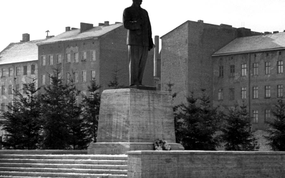 Stalin's statue, as photographed from the only side permitted by East German police.