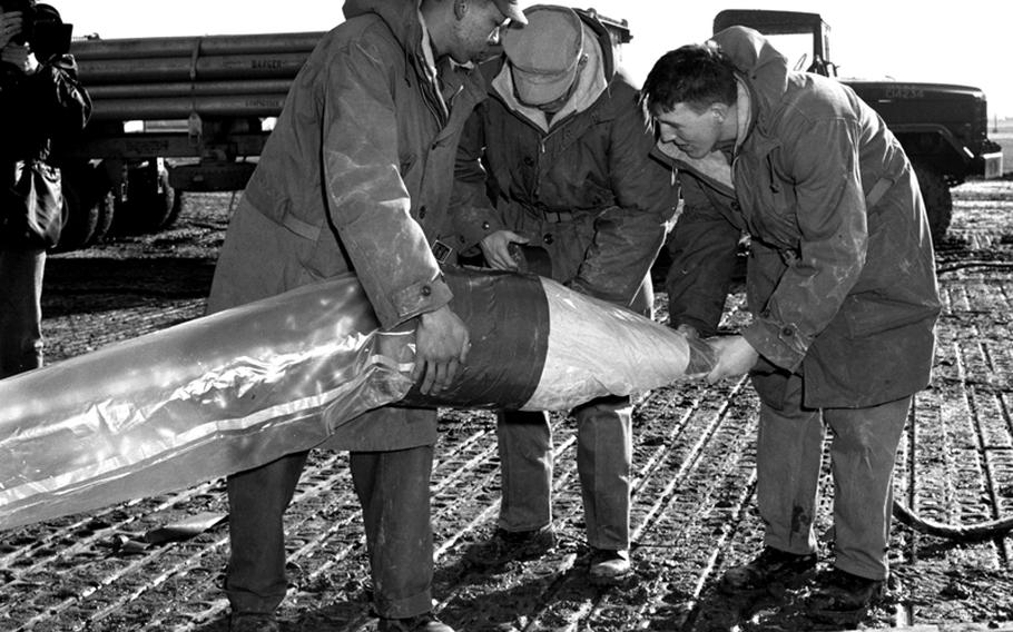 Crewmen prepare for the launch of a weather balloon at Giebelstadt, Germany, in 1956.