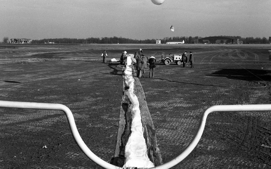 Preparations are made for the launch of a weather balloon at Giebelstadt, Germany, in 1956.