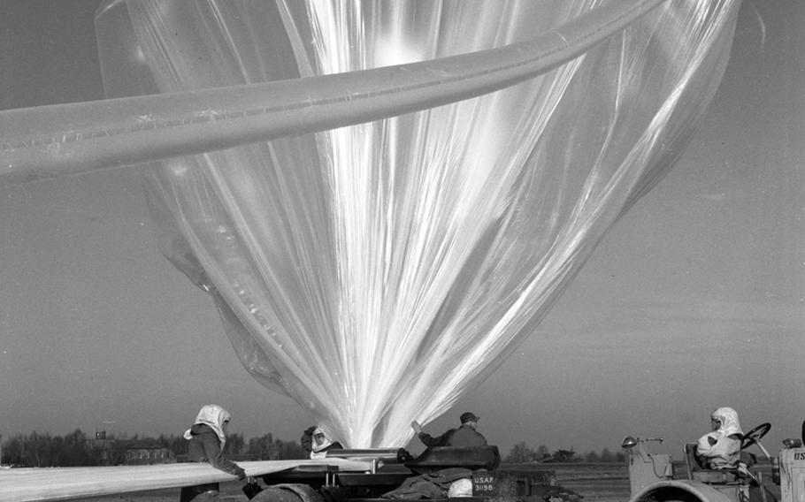 A weather balloon is prepared for launch at Giebelstadt, Germany, in 1956.