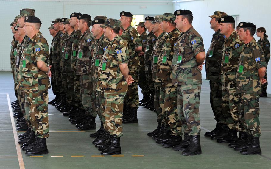 Kosovo Security Force NCOs stand in formation at their senior NCO course graduation ceremony at a KSF base in Ferizaj, Kosovo, last year. NATO has announced that the KSF has reached full operational capability, a key milestone for Kosovo, which hopes to join NATO one day.