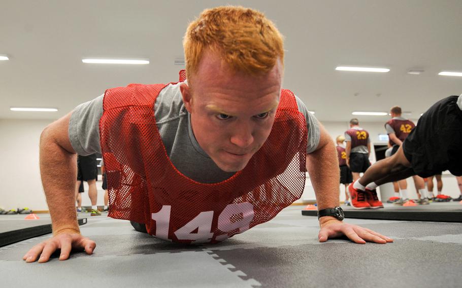 First Lt. Cody Davis, assigned to the 10th Army and Air Missile Defense Command, does pushups during U.S. Army Europe's 2013 Best Junior Officer Competition.