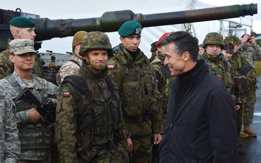 NATO Secretary General Anders Fogh Rasmussen meets with soldiers participating in Steadfast Jazz, Nov. 7, 2013.