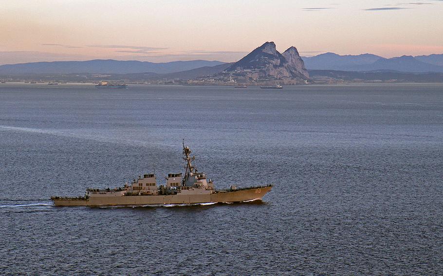 The USS Roosevelt, attached to the George H.W. Bush Carrier Strike Group, transits the Straits of Gibraltar near the Mediterranean Sea on Feb. 27, 2014. 